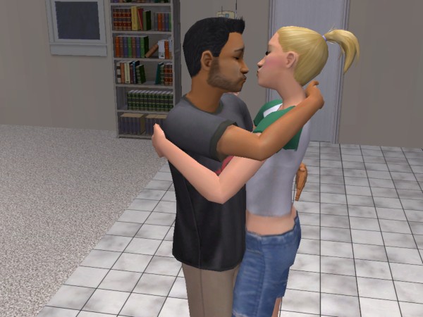 Rhonda and Alessandro kiss