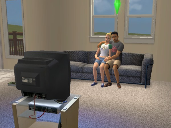 Rhonda and Alessandro watch TV